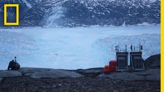 4MileWide Iceberg Breaks From Greenland Glacier  National Geographic [upl. by Oakie]